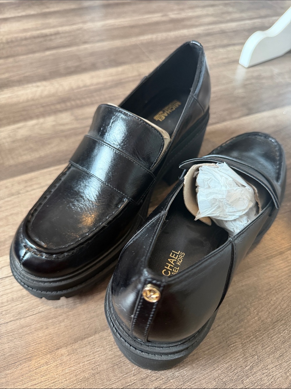 NWOB Michael Kors Black Leather Penny Loafers with Gold Logo Accent